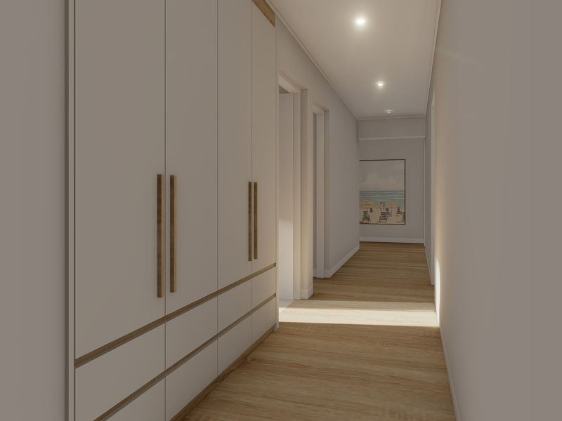 A bright, modern hallway featuring sleek built-in cabinetry with timber accents and warm recessed downlighting, leading towards a secondary living space.