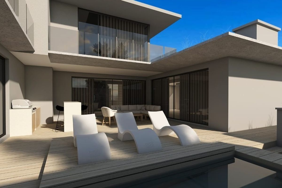 Modern outdoor pool area featuring timber decking, a built-in outdoor kitchen, and seamless access to the residence through large sliding glass doors.