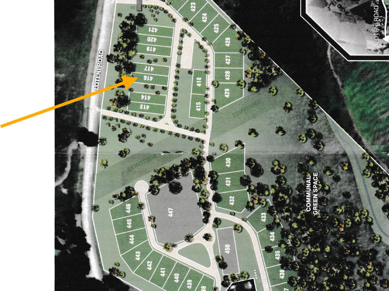 A site development plan showing the layout of residential plots within the estate, with an arrow indicating the location of plot 416.