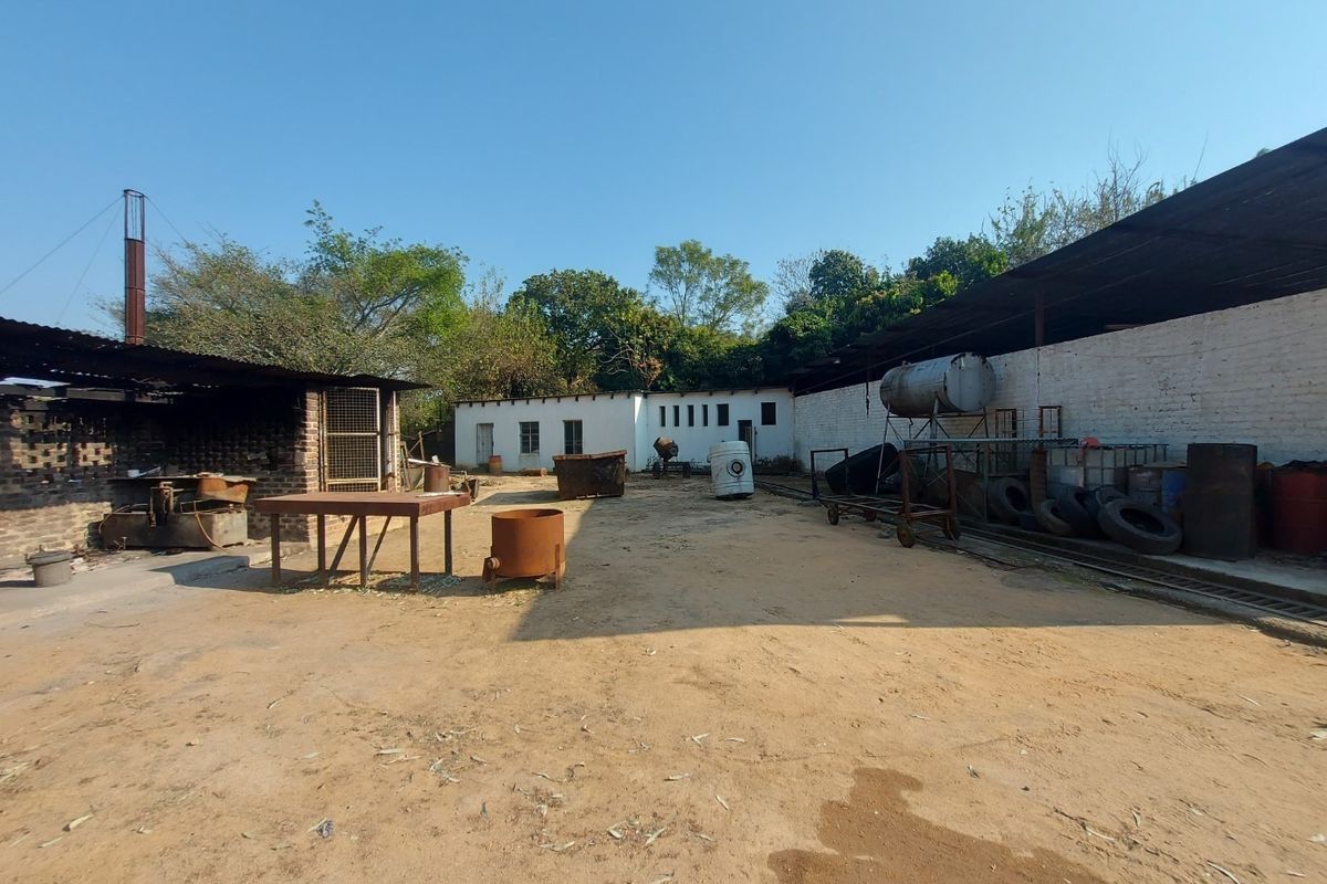 The property offers a blend of security, functionality and natural beauty. - Photo 3