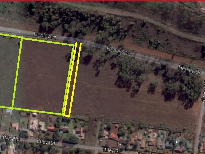 Aerial view of vacant residential land parcels located along Henley Drive, showing property boundaries and surrounding neighborhood infrastructure.