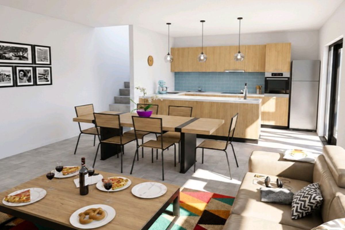 Modern open-plan living and dining area featuring a contemporary kitchen with light wood cabinetry, integrated appliances, and a functional kitchen island.