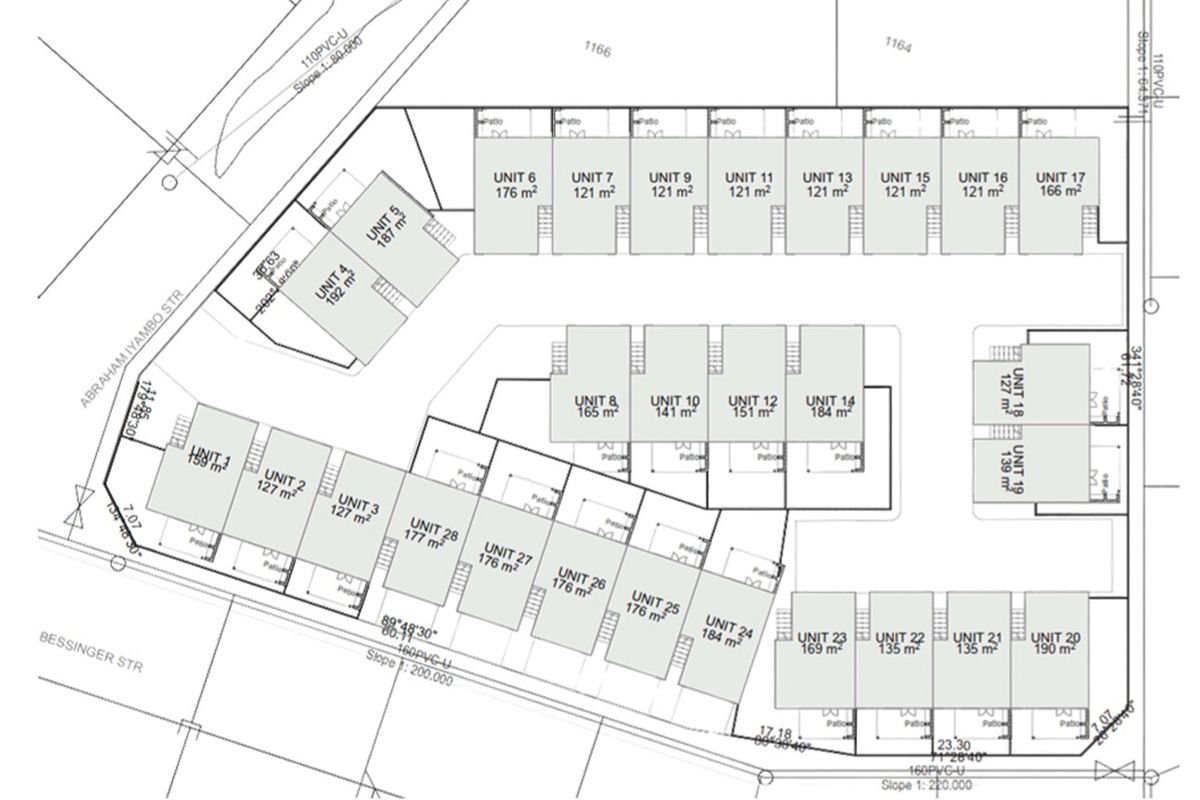 Architectural site plan showing the layout and unit sizes for a townhouse development complex.