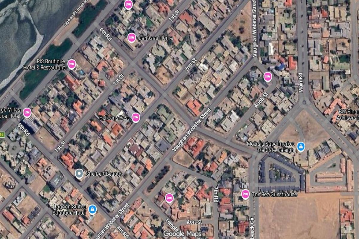 An aerial satellite view of the residential neighborhood and surrounding street layout.