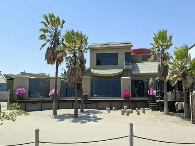 Exquisite Beachfront Living – Where the Ocean Becomes Your Backyard - Photo 2