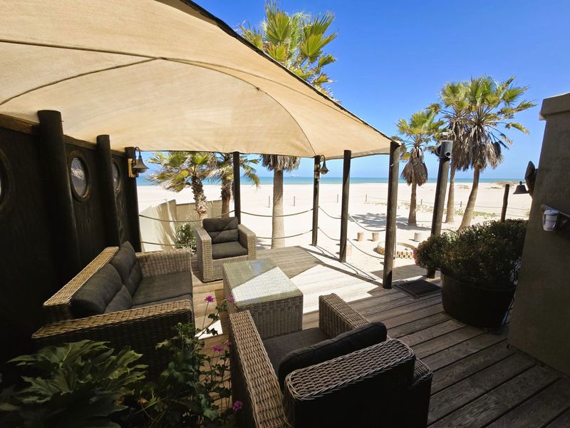 Exquisite Beachfront Living – Where the Ocean Becomes Your Backyard - Photo 8