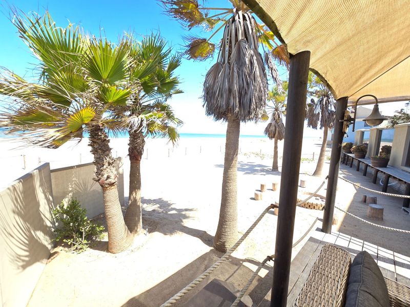 Exquisite Beachfront Living – Where the Ocean Becomes Your Backyard - Photo 6