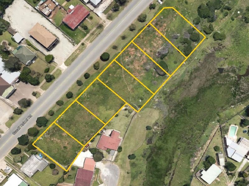 An aerial view of a vacant residential land parcel located along Graaff Reinet Road, showing the plot boundaries and surrounding neighborhood context.