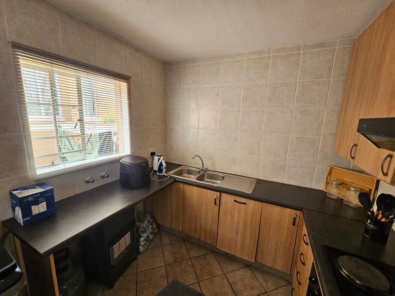 Charming 2-Bedroom Duplex Townhouse for Sale in Vaalpark! - Photo 4