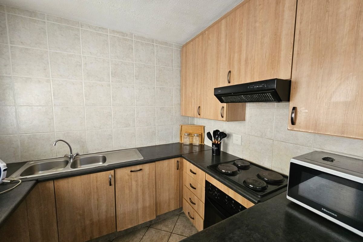 Charming 2-Bedroom Duplex Townhouse for Sale in Vaalpark! - Photo 5