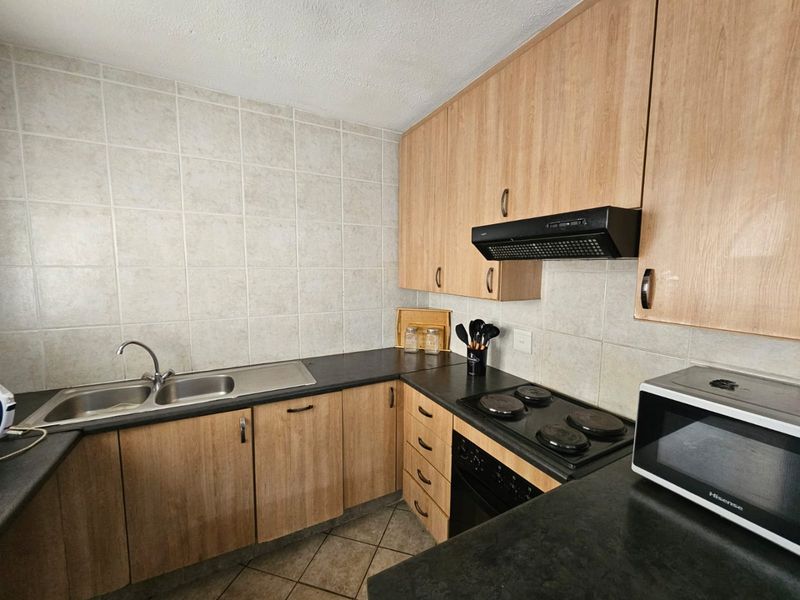 Charming 2-Bedroom Duplex Townhouse for Sale in Vaalpark! - Photo 5