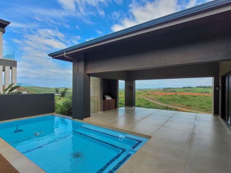 Modern home in Zimbali lakes estate with panoramic golf course view. - Photo 1