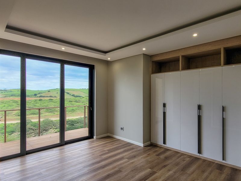 Modern home in Zimbali lakes estate with panoramic golf course view. - Photo 10