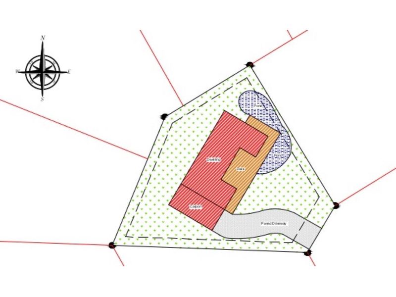 A site plan showing the layout of the dwelling, deck, carport, paved driveway, and pond on the residential property.