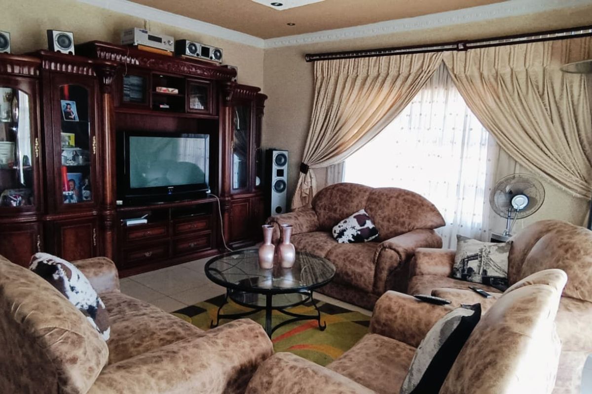 Exclusive 3-Bedroom home, where modern elegance meets practical living - Photo 2