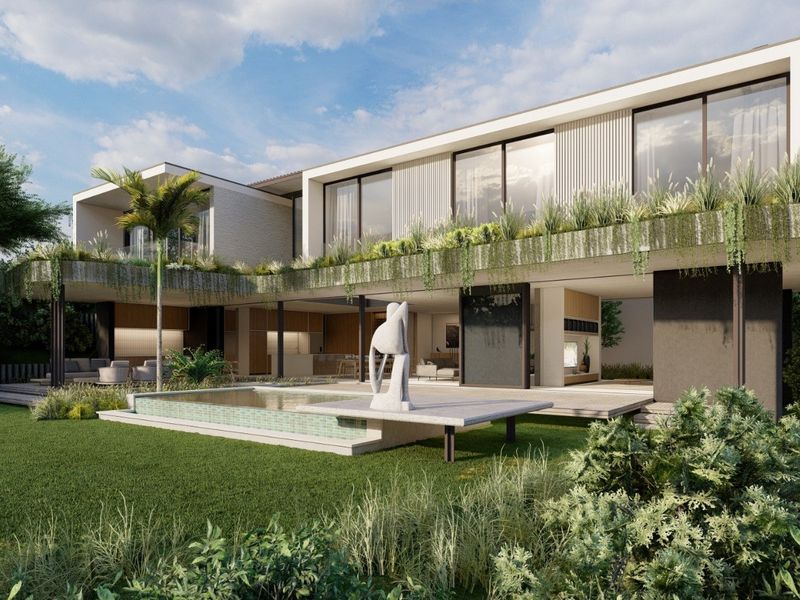 A modern luxury residence featuring a seamless indoor-outdoor flow, a private swimming pool, and extensive landscaped gardens with contemporary architectural finishes.