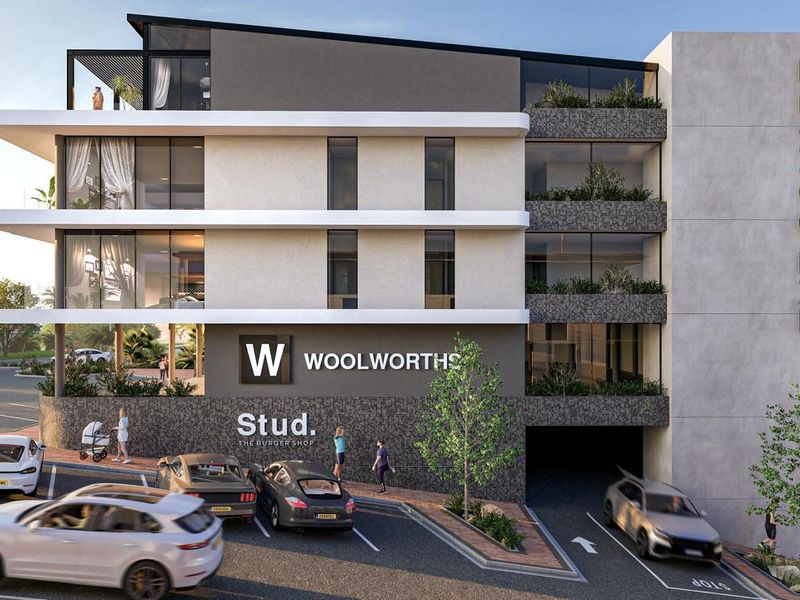 Modern multi-story apartment building facade featuring contemporary architectural design, integrated retail space, and secure basement parking access.