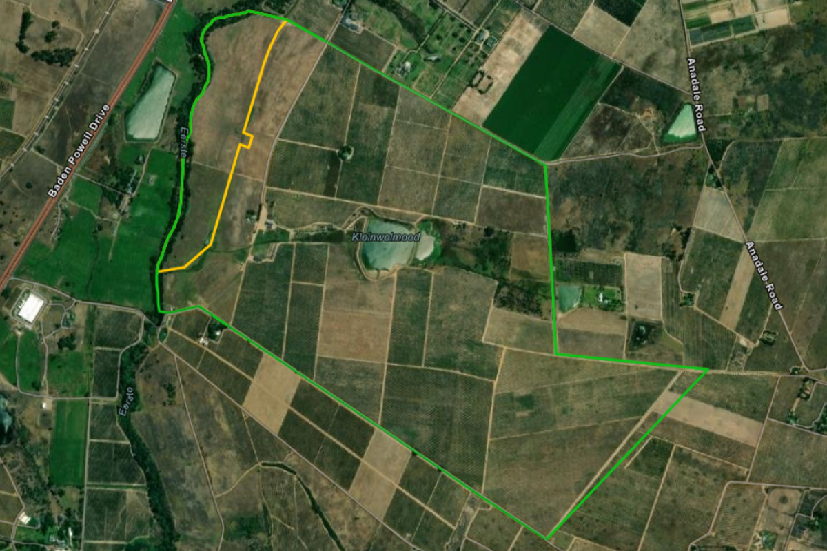 An aerial view of the farm property showing land boundaries, agricultural fields, and existing water infrastructure.
