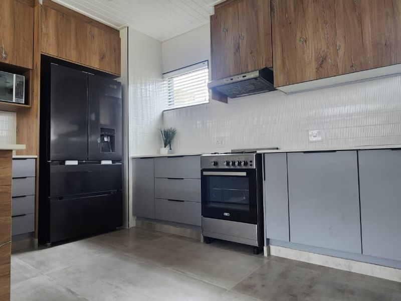 Brand new stylish double story home in a secure complex - Photo 8