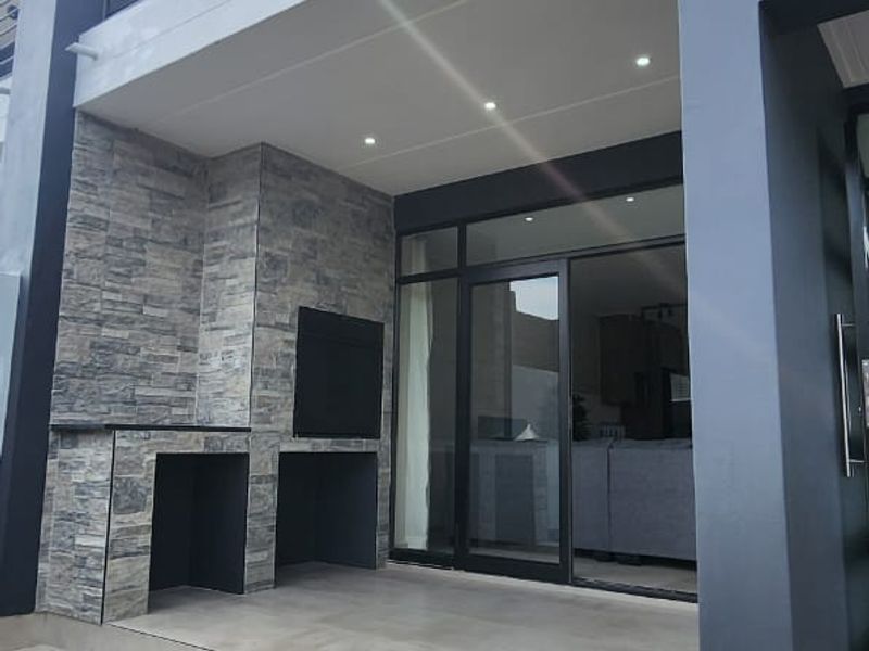 Brand new stylish double story home in a secure complex - Photo 6