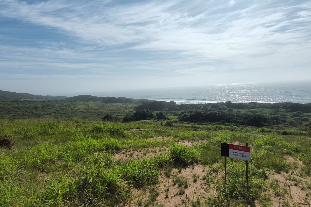 A scenic view of the coastal landscape and ocean from the vacant residential land plot.