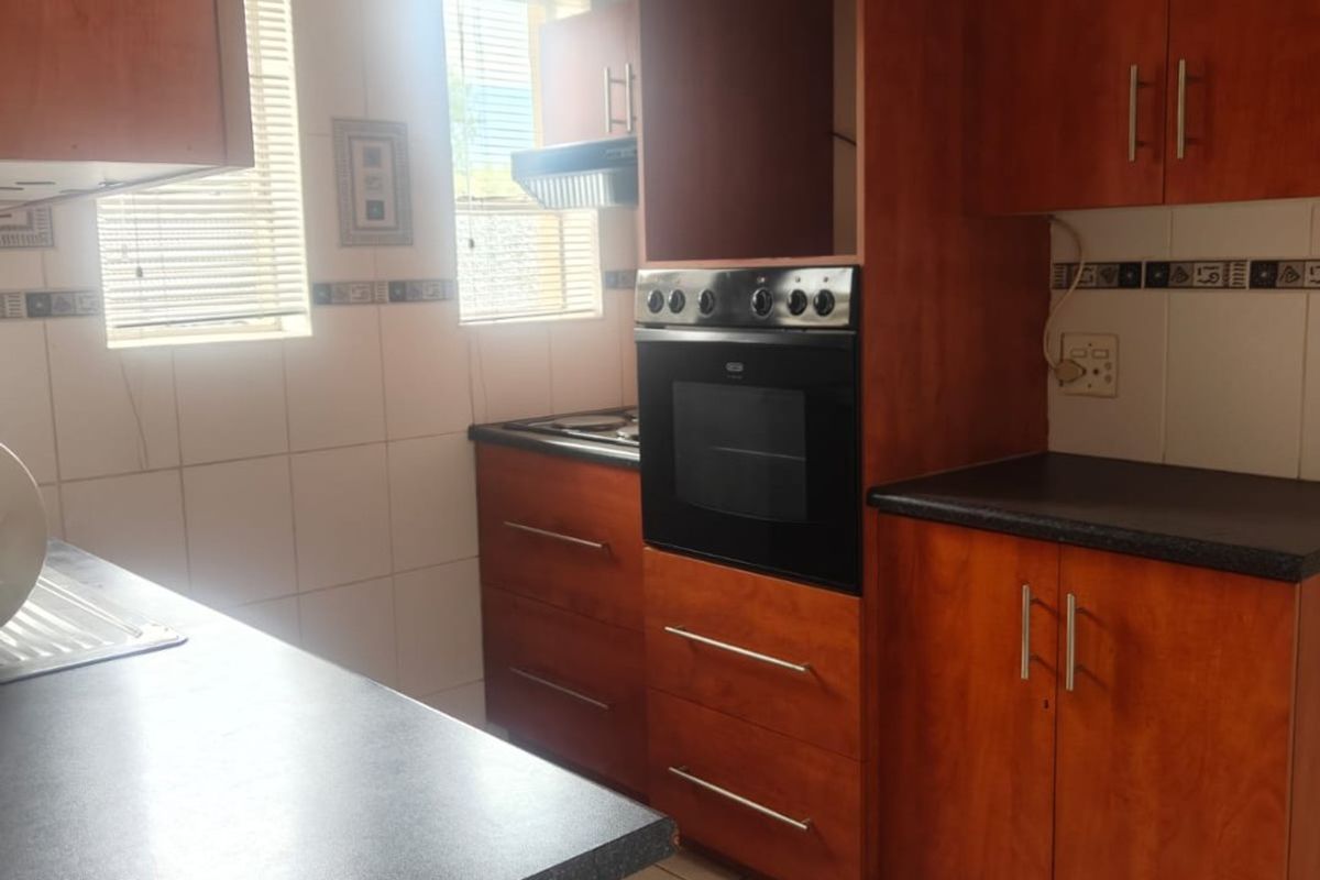 This lovely unit is located in a secure complex walking distance to town. - Photo 4