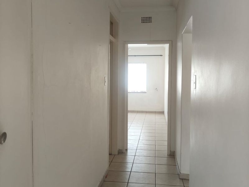 This lovely unit is located in a secure complex walking distance to town. - Photo 10