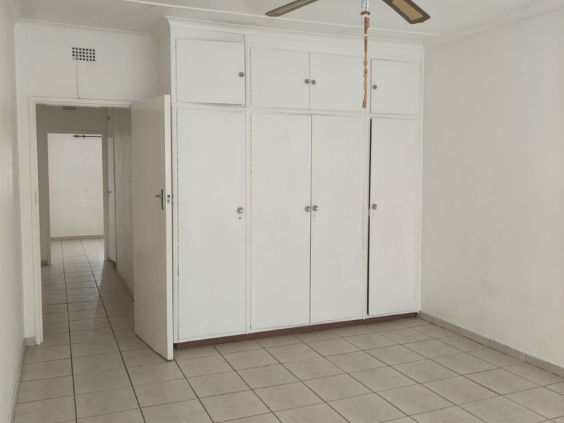 This lovely unit is located in a secure complex walking distance to town. - Photo 9