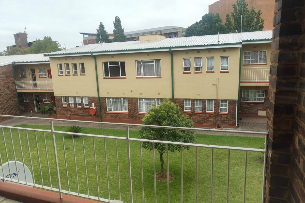 This lovely unit is located in a secure complex walking distance to town. - Photo 5