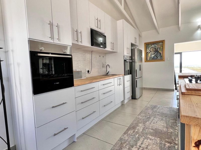 Modern Home in Blue Waters Estate - Photo 9