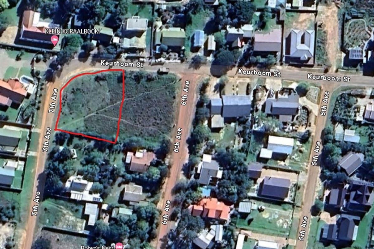 Aerial view of a vacant residential corner plot situated at the intersection of Keurboom Street and 7th Avenue.