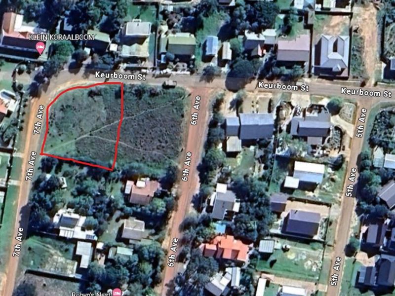 Aerial view of a vacant residential corner plot situated at the intersection of Keurboom Street and 7th Avenue.