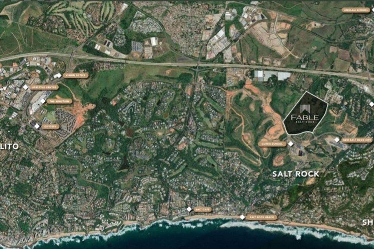Aerial view showing the location of the Fable Salt Rock development in relation to surrounding amenities, schools, and the coastline.