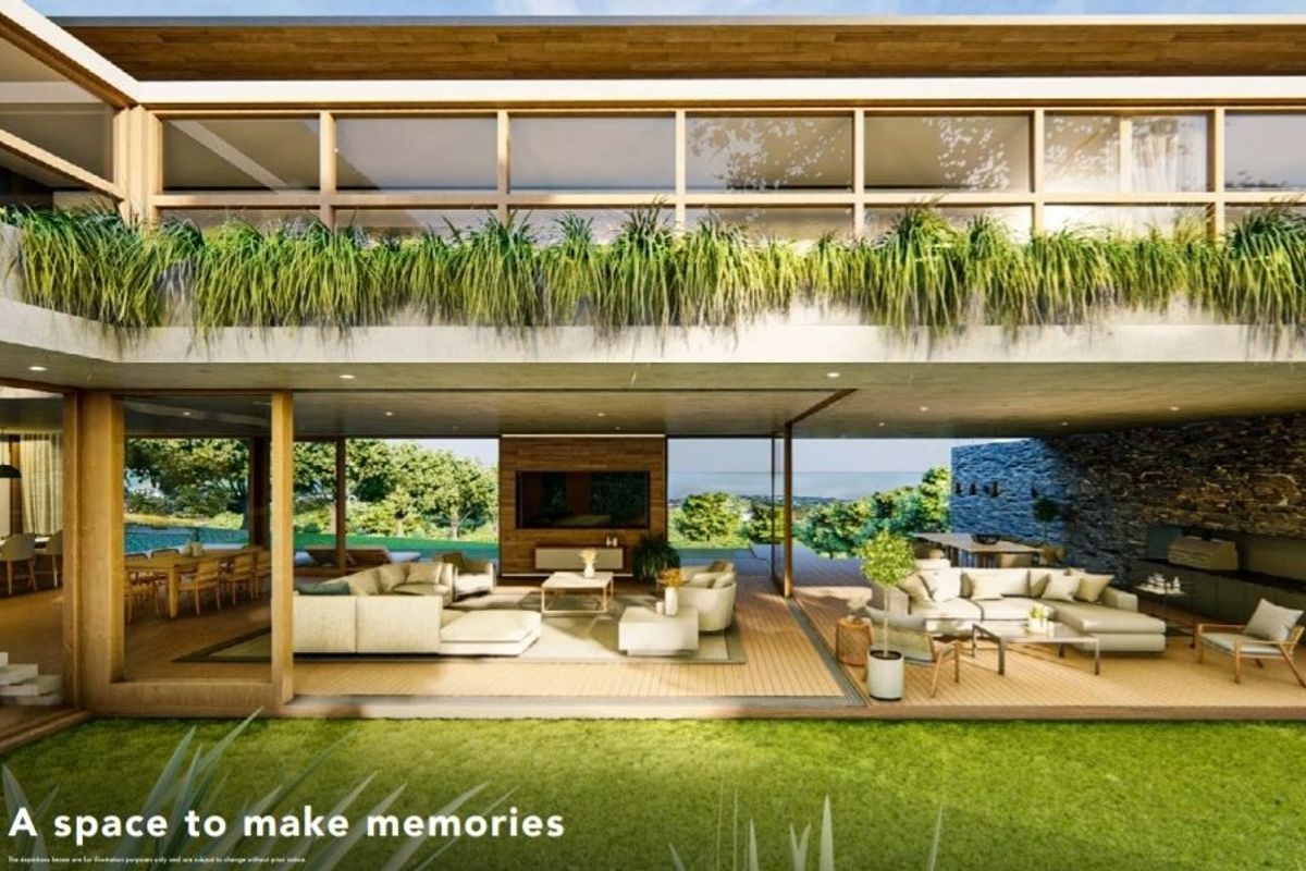 A modern open-plan living area featuring expansive glass walls, timber decking, and seamless indoor-outdoor flow, showcasing contemporary architectural design.