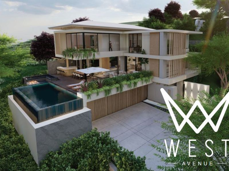 Aerial view of a modern luxury residence featuring an infinity pool, sunken fire pit, outdoor bar, and expansive timber decking.
