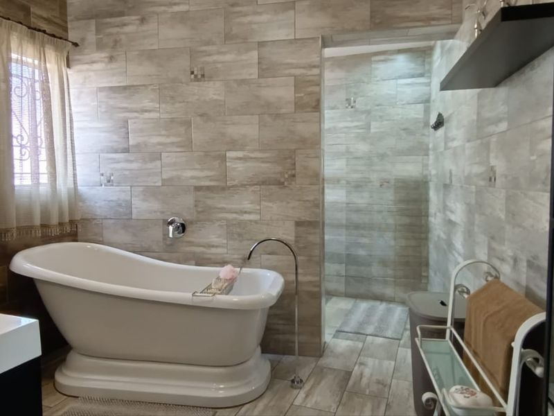 This Fascinating, Charming Home with a backyard of Enchanted Beauty includes: - Photo 9