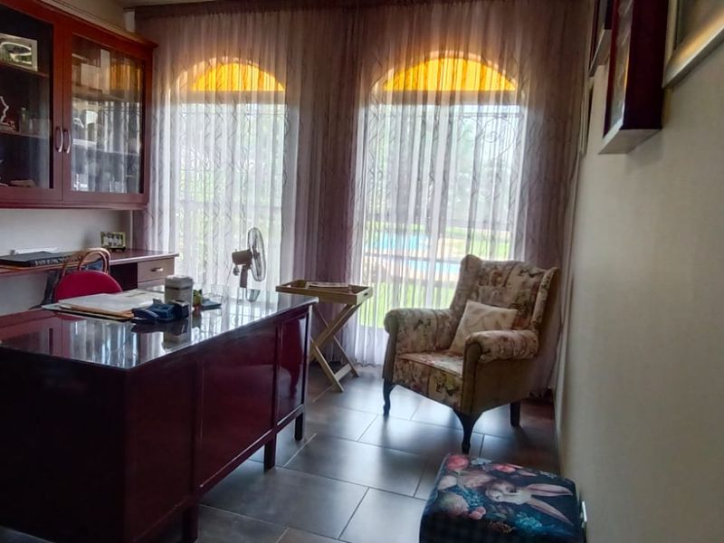 This Fascinating, Charming Home with a backyard of Enchanted Beauty includes: - Photo 5