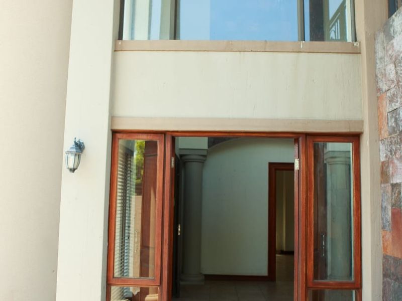 Exquisite Double-Storey Family Home in a Secure Estate - Photo 4