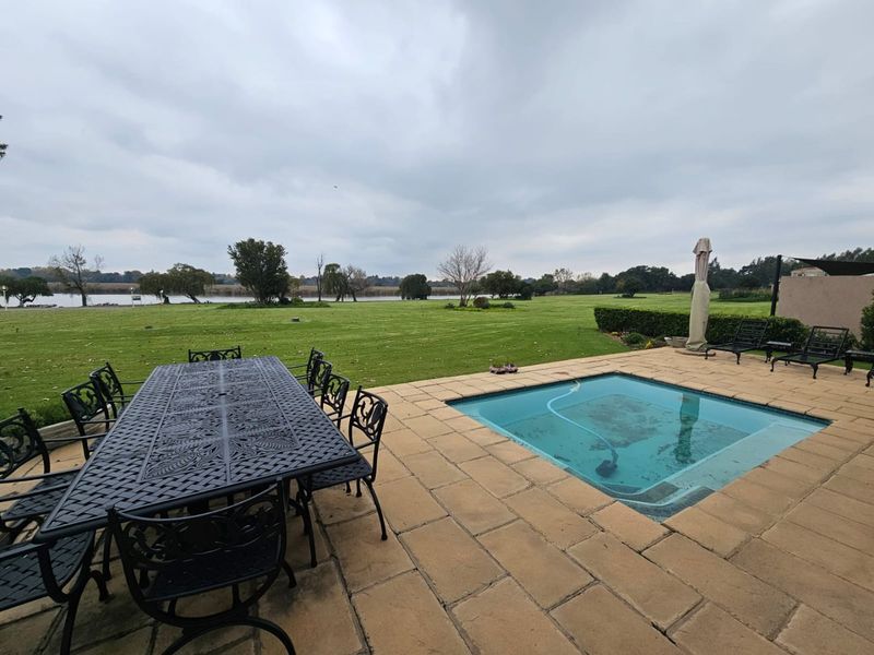 Absolutely Stunning Riverfront Home for Sale in Secure Estate! - Photo 7