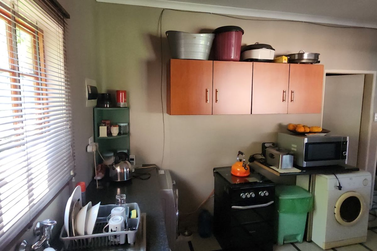 Spacious 4-Bedroom Family Home with Income-Generating Flatlet For Sale in Modelpark - Photo 4