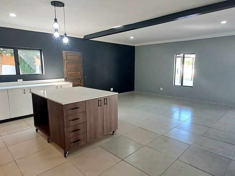Stylish Family Retreat in Sought-After Risiville - Photo 7