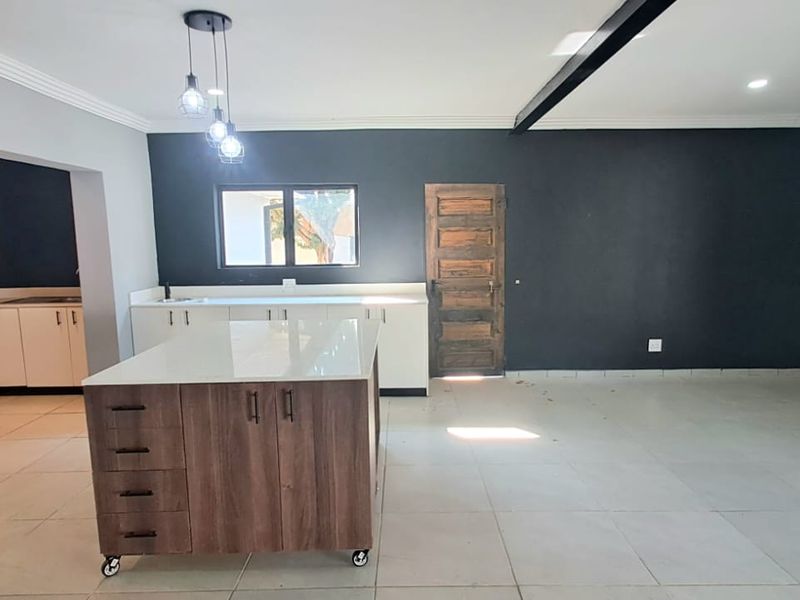 Stylish Family Retreat in Sought-After Risiville - Photo 6