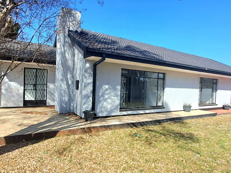 Stylish Family Retreat in Sought-After Risiville - Photo 1