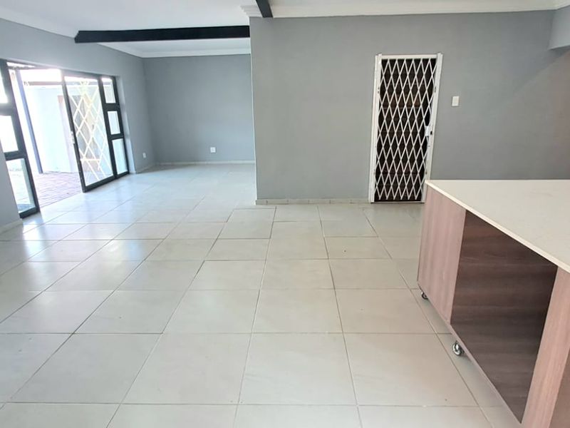 Stylish Family Retreat in Sought-After Risiville - Photo 10