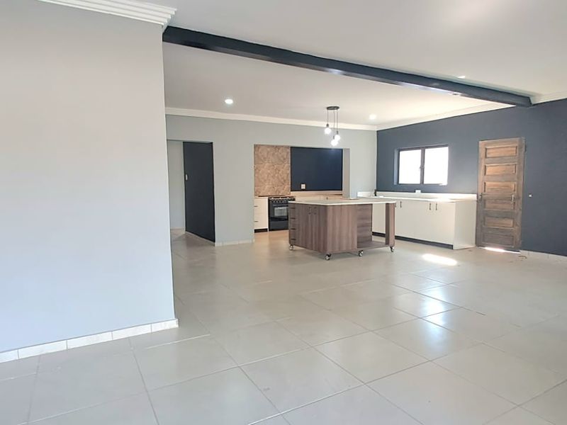 Stylish Family Retreat in Sought-After Risiville - Photo 9