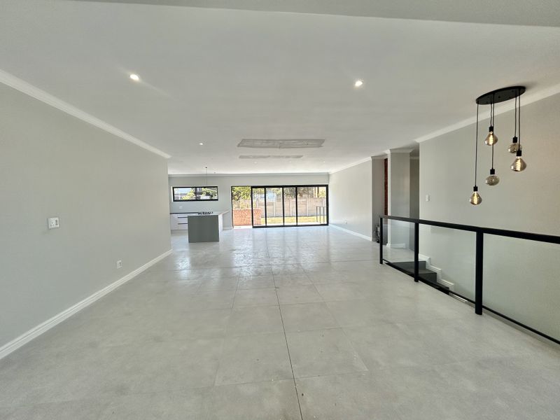 Modern Architectural Gem with Seamless Indoor-Outdoor Living currently under construction - Photo 6