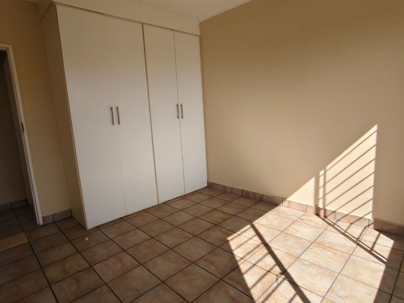 Lovely 2 bedroom unit in a secure complex with 24 hour security. - Photo 6