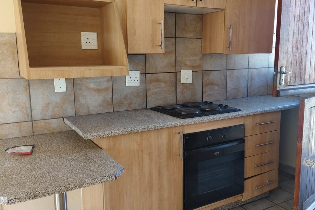 Lovely 2 bedroom unit in a secure complex with 24 hour security. - Photo 4