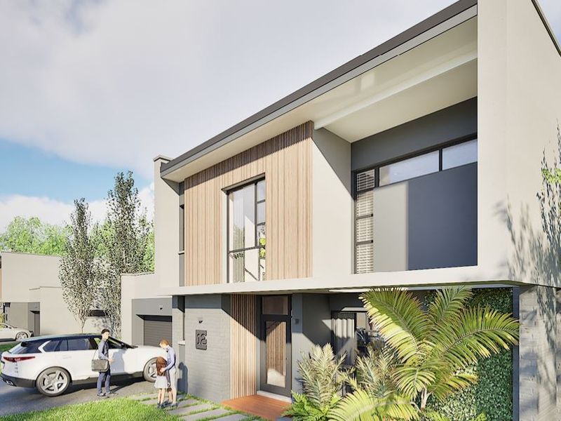 Modern two-story residential facade featuring contemporary timber cladding, dark brickwork, and large glass windows with a covered entrance.