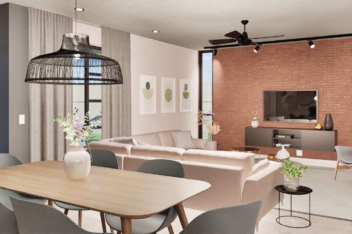 Modern open-plan living and dining area featuring a striking exposed brick feature wall, recessed lighting, and large windows providing ample natural light.